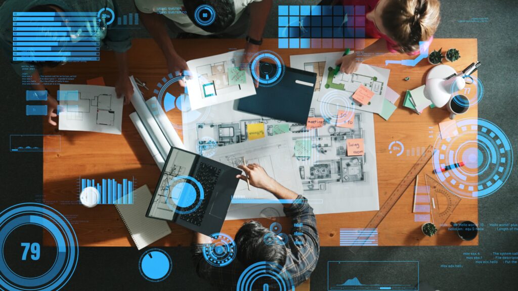 Team in einem modernen Meetingraum arbeitet gemeinsam an IT-Projekten und Datenanalysen